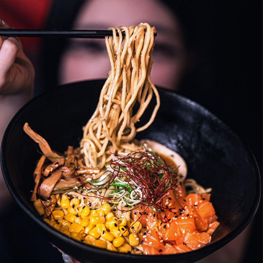 Relishing a hearty bowl of ramen with fresh ingredients